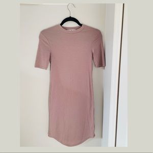 Form-fitting purple dress